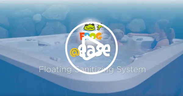 A promotional image for the FROG @ease Floating Sanitizing System showing a hot tub or spa with clear blue water and the product logo prominently displayed in the center.